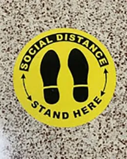 The floor was marked with stickers to show trial participants where to wait.